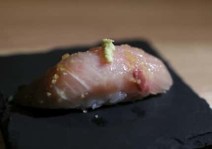 One of Sushi By Scratch's signature dishes is this first-course starter: hamachi with sweet...