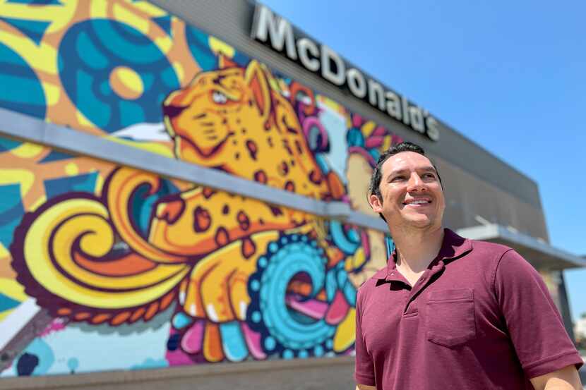 Arlington artist Christopher Gonzalez was commissioned to produce the Latino-themed murals...