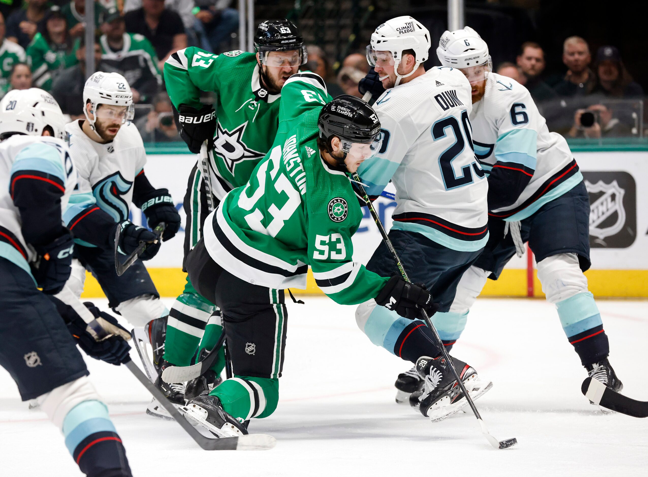 Dallas Stars center Wyatt Johnston (53) shoots the puck past Seattle Kraken defenseman Vince...