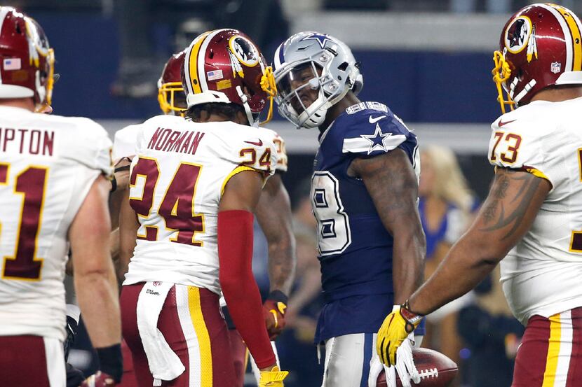 Washington Redskins cornerback Josh Norman (24) and Dallas Cowboys wide receiver Dez Bryant...