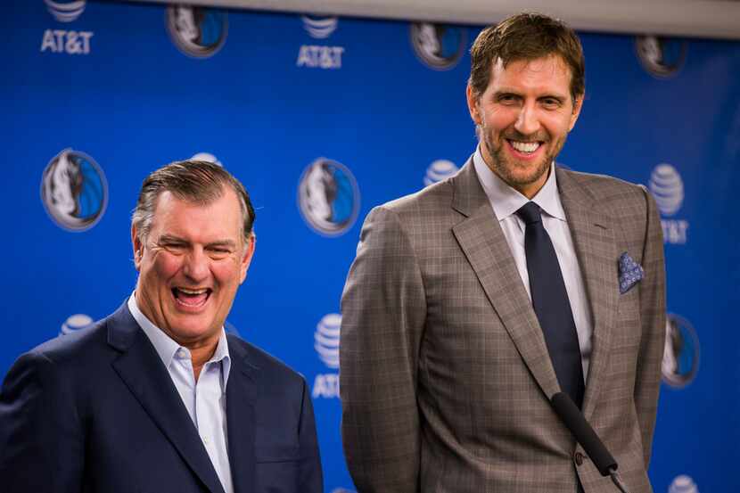 Dallas Mayor Mike Rawlings and Dallas Mavericks forward Dirk Nowitzki (41) speak to...