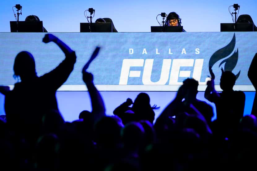 Fans cheer as Noh "Gamsu" Youngjin of the Dallas Fuel (center) and his teammates compete in...