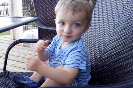 Police say 16-month-old Ashton Ness was slammed onto the sidewalk by his father, who then...