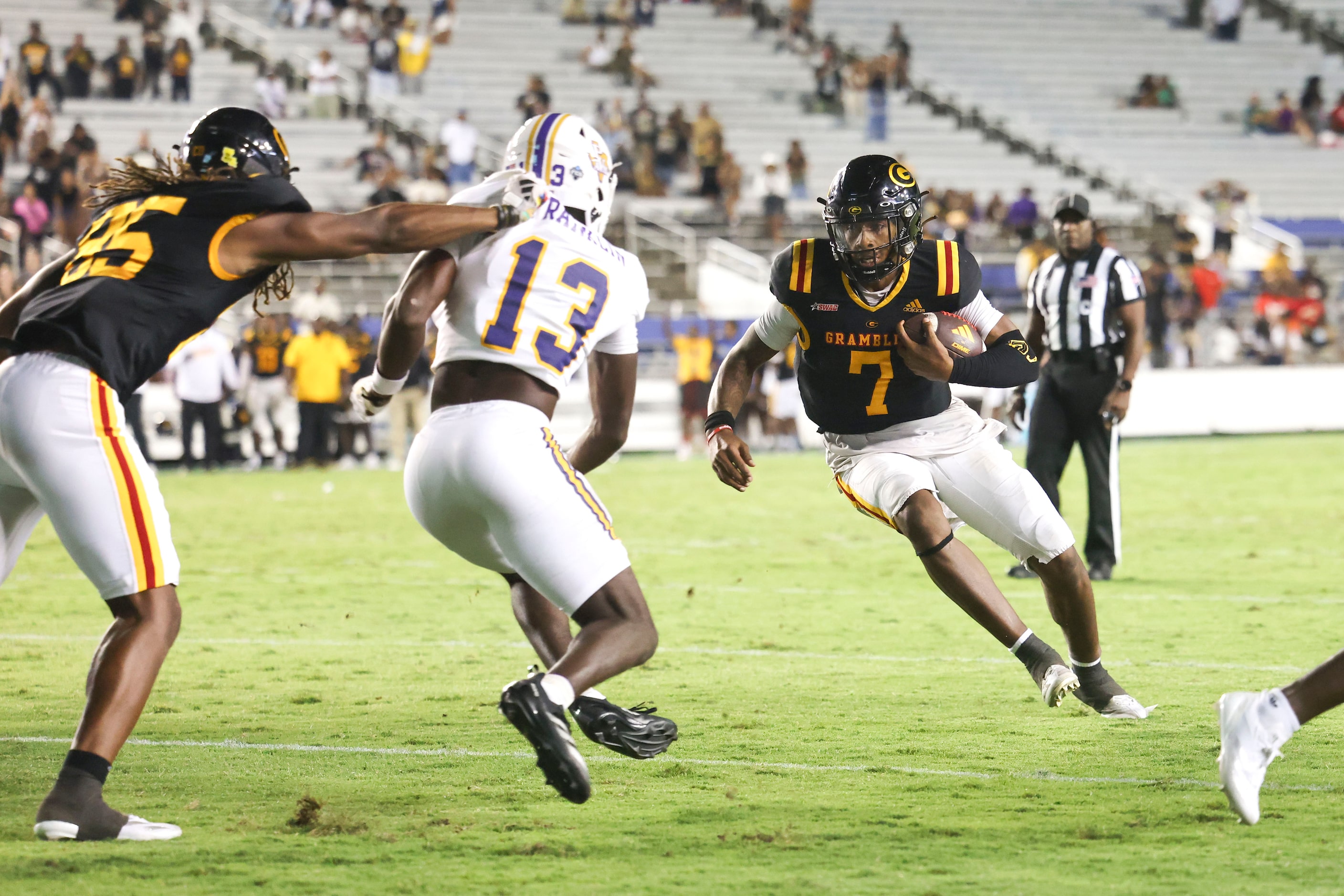 Grambling State quarterback Myles Crawley runs the ball during the overtime of State Fair...