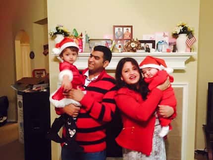 Raj and Samira Siwakoti with their young children.