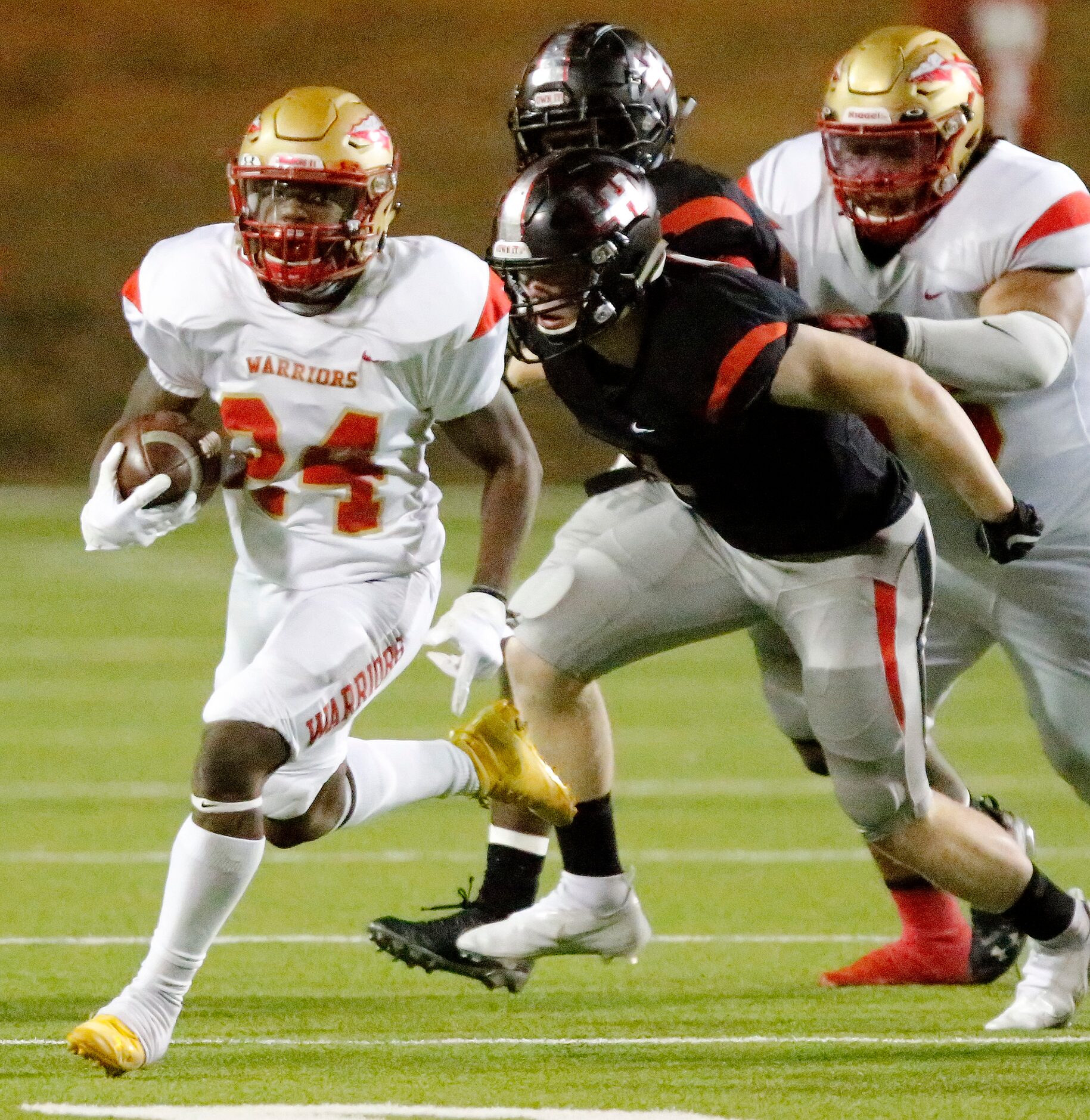 South Grand Prairie High School running back Troy Whitaker (24) breaks off a long run near...