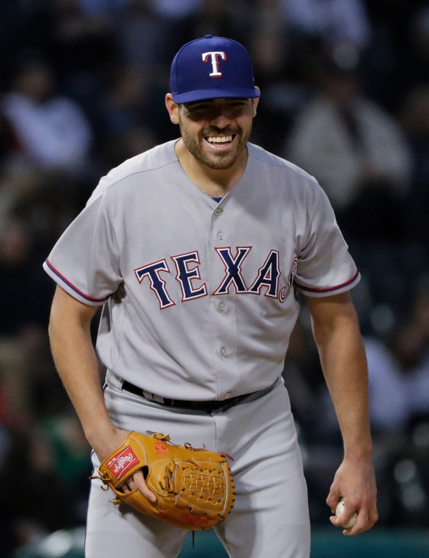 Texas Rangers starting pitcher Matt Moore reacts after Chicago White Sox's Welington...