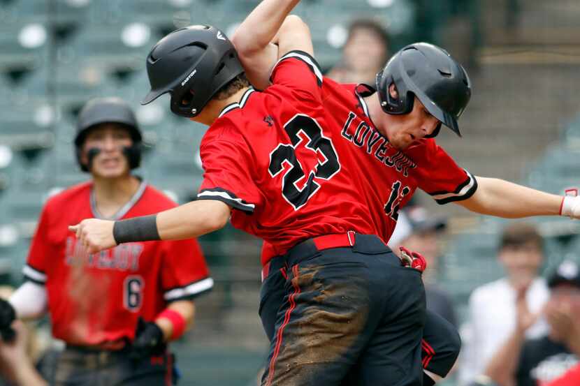 Lovejoy infielder Kolby Branch (23) gets tied-up in the moment as he celebrates with...