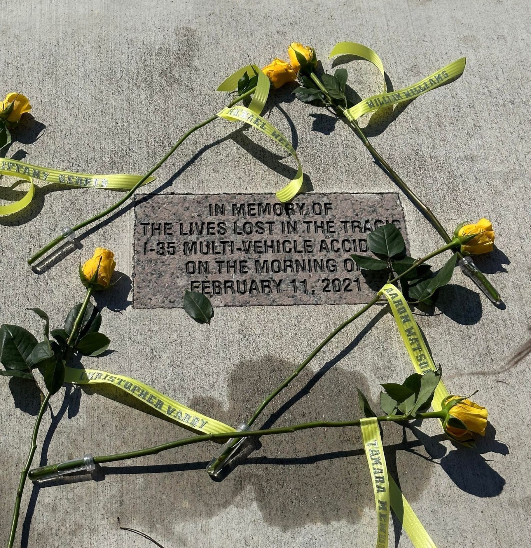 A memorial for the six people who died in the multivehicle crash Feb. 11, 2021, along...