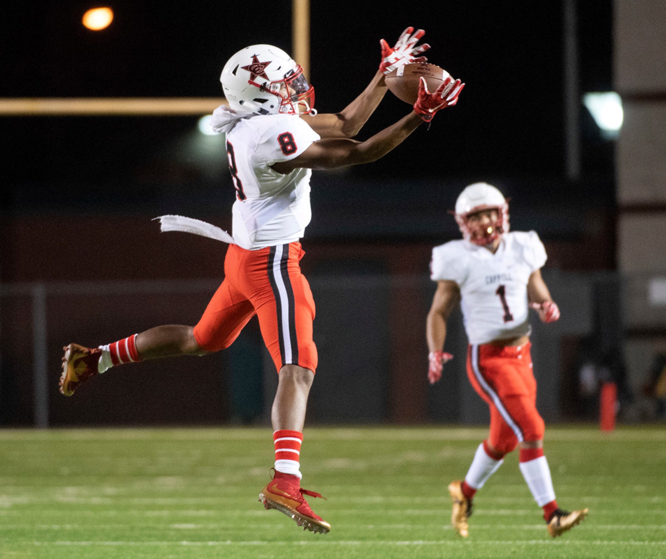 Coppell senior wide receiver Rasheed Noel (8) catches a pass during the first half of a high...