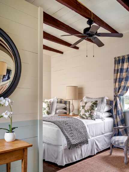 Bedroom with wood beams on ceiling