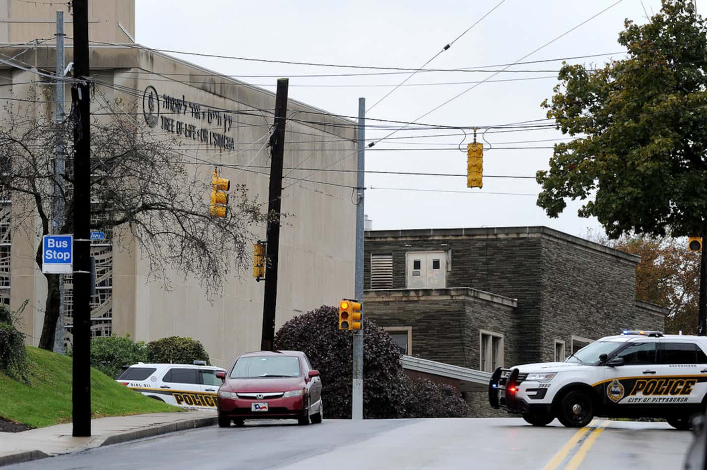 Police respond to an active shooter situation at the Tree of Life synagogue on Wildins...