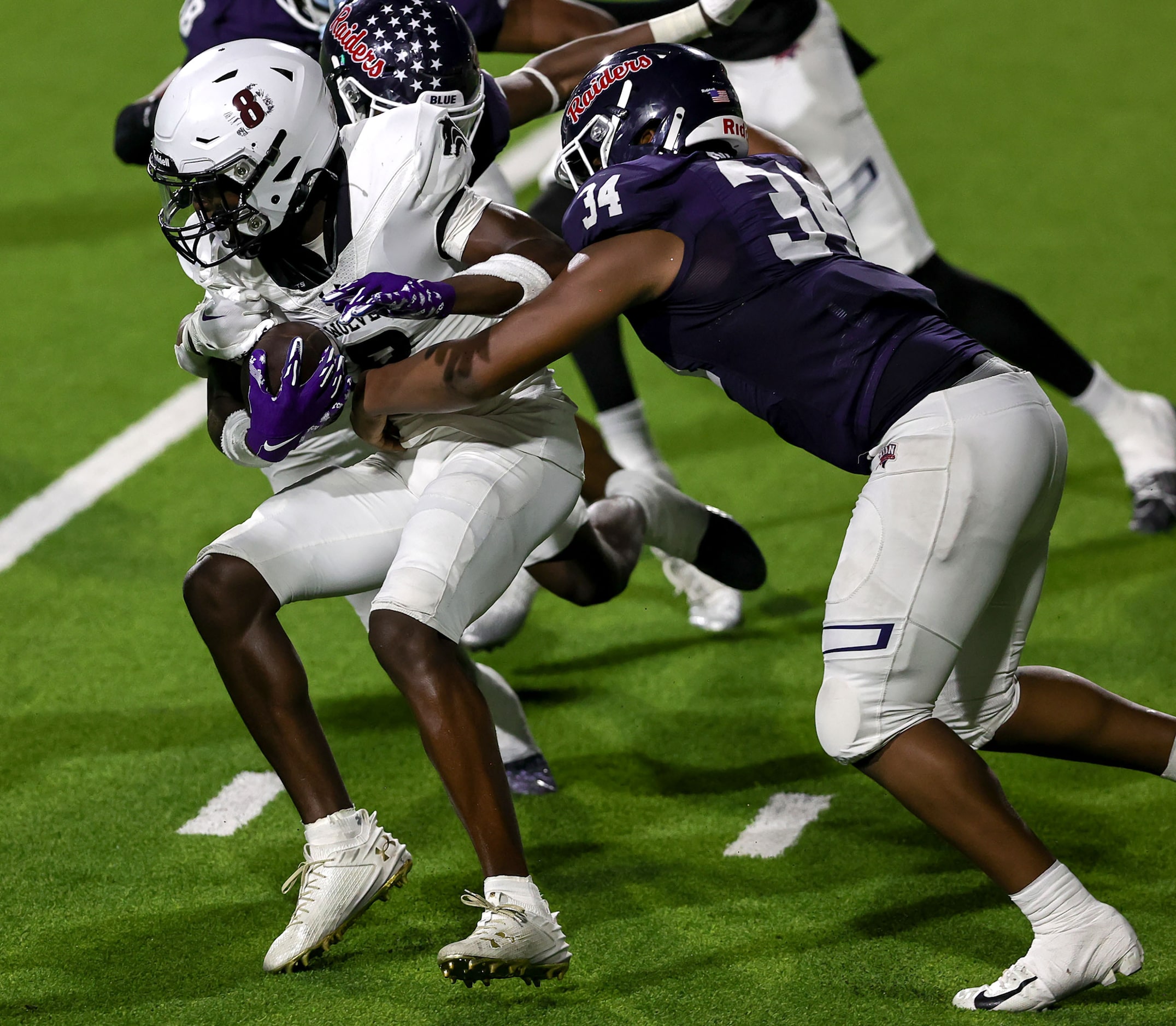 Mansfield Timberview wide receiver Chance Collins (8) comes up with a short reception and is...