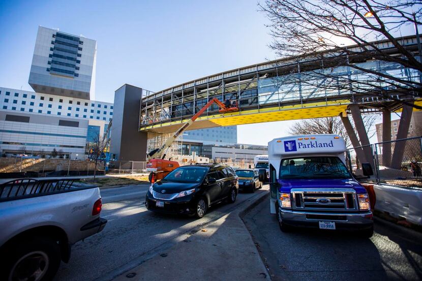 
An 870-foot-long pedestrian bridge connecting the new portion of Parkland Memorial Hospital...