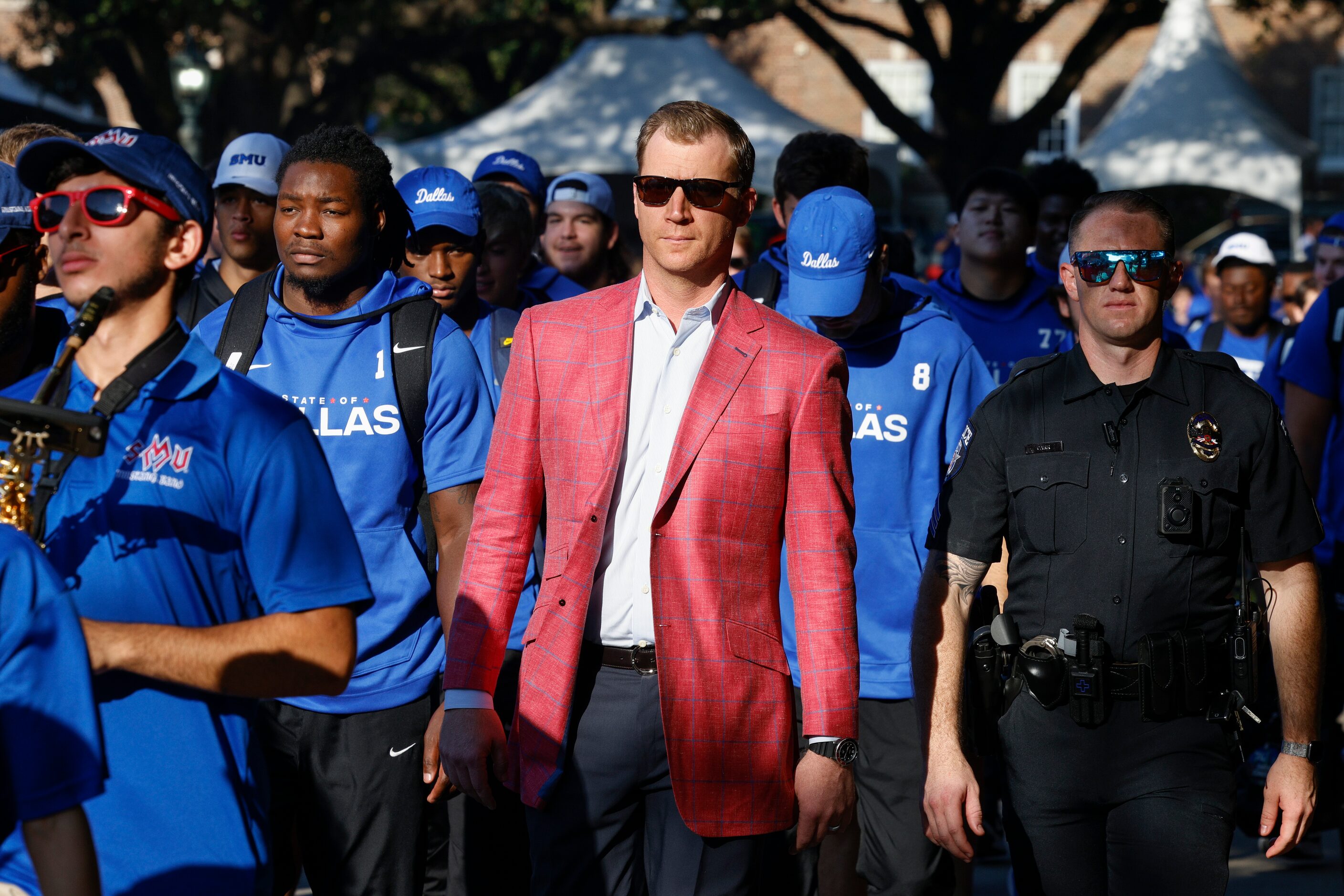 SMU head coach Rhett Lashlee walks along Bishop Boulevard before a game against TCU at Ford...