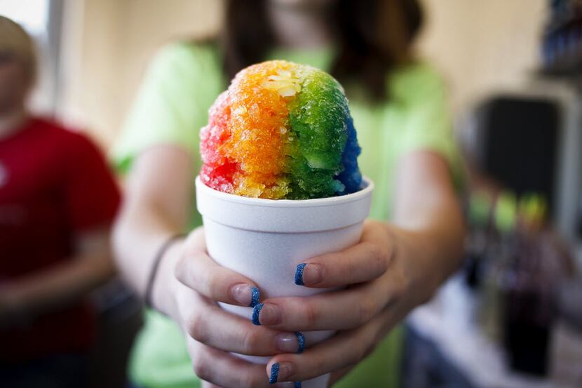 Here's a rainbow flavored shaved ice snow cone from Sugar Mountain in Plano.