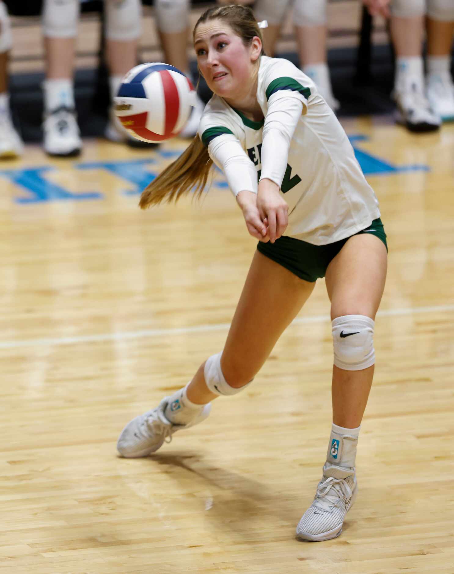 Frisco Reedy’s Ella Gamber (42) hits the ball against Frisco Wakeland during the first set...