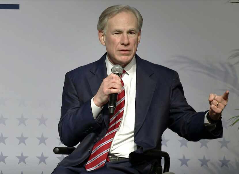 Texas Gov. Greg Abbott, making a COVID-19-related announcement in March, later issued a...
