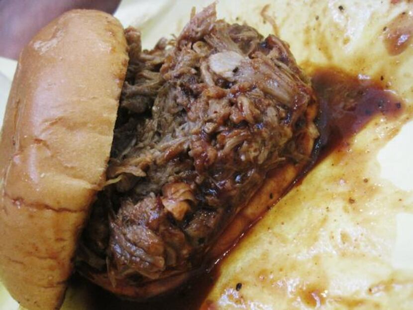 
Wenzel's pork butt sandwich is one of the messiest barbecue experiences around - but worth...