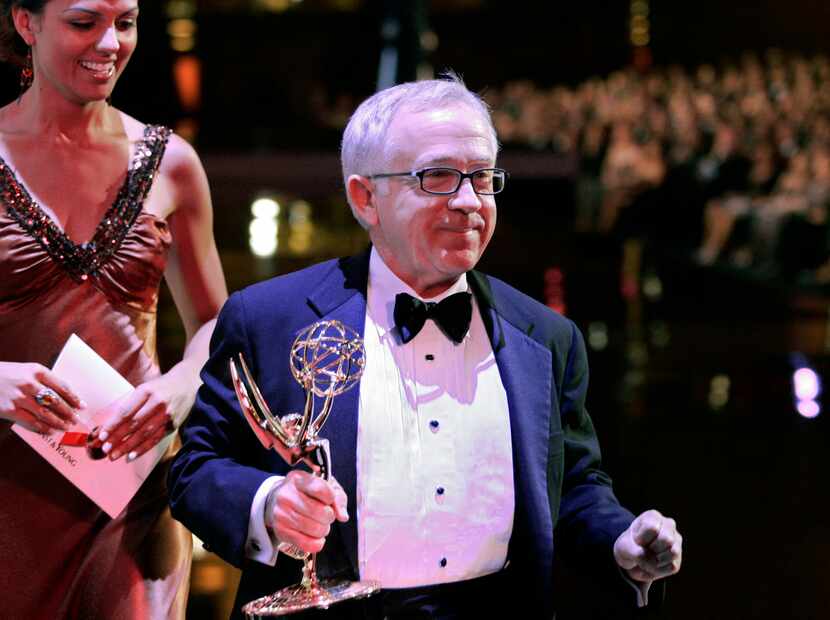 FILE - Leslie Jordan carries his award for outstanding guest actor in a comedy series, for...