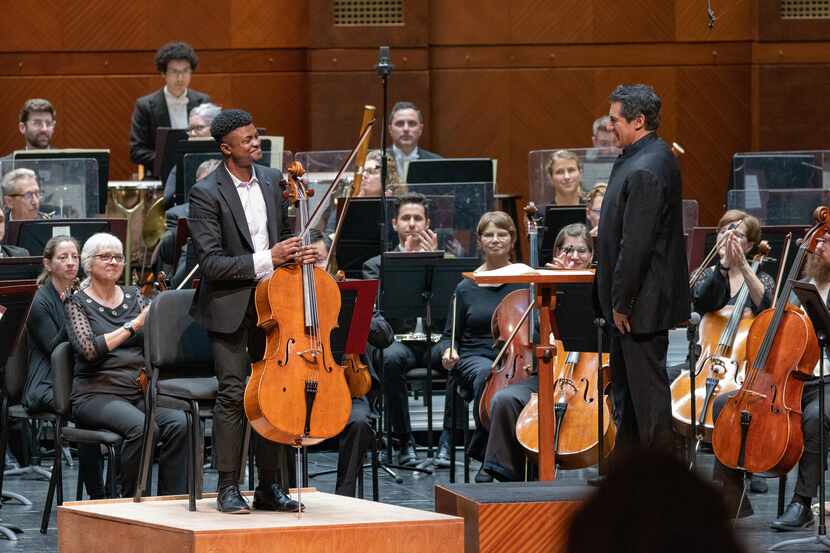 Cellist Sterling Elliott acknowledged applause after performing with the Fort Worth Symphony...