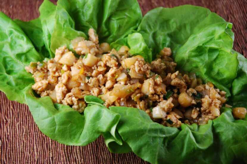 Paired with fresh fruit, Chicken Lettuce Wraps are good enough for a meal at home.