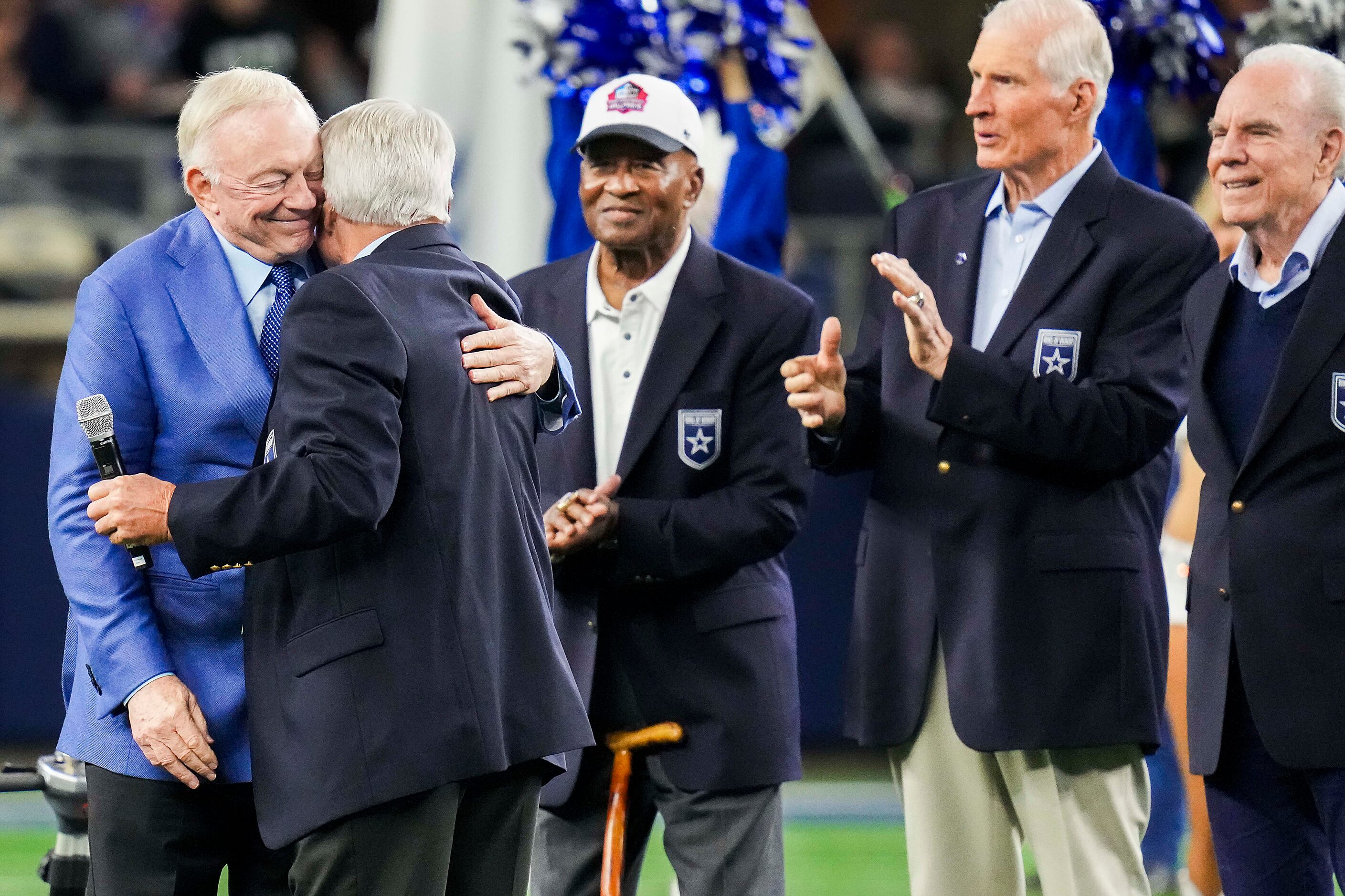 Dallas Cowboys owner and general manager Jerry Jones hugs former Cowboys head coach Jimmy...