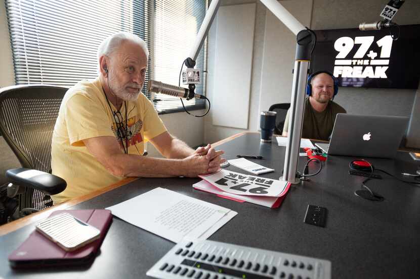 Radio legend Mike Rhyner, left, and co-host Mike Sirois listen to the intro before they go...