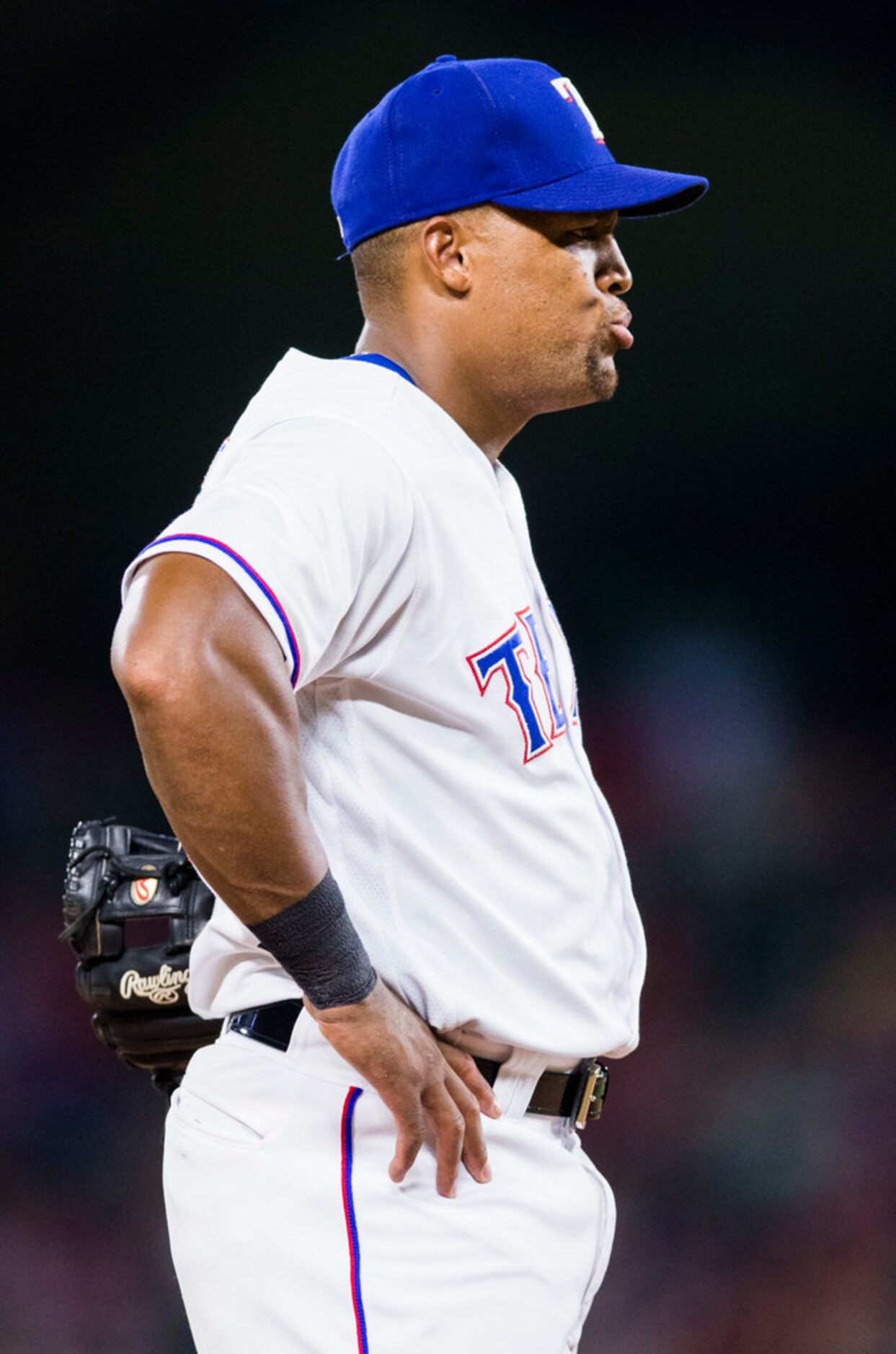 Texas Rangers third baseman Adrian Beltre (29) watches from third base as the Cleveland...