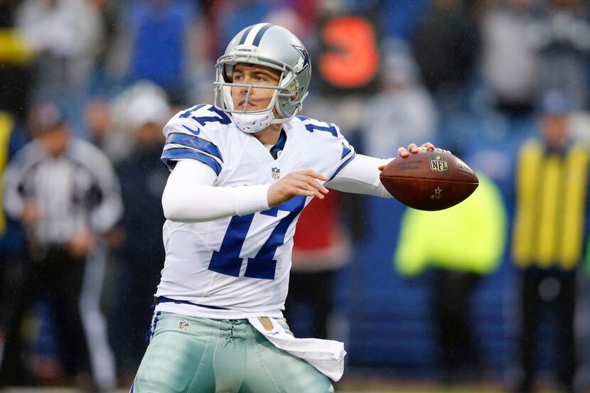 Dallas Cowboys quarterback Kellen Moore (17) attempts and completes a pass for a first down...