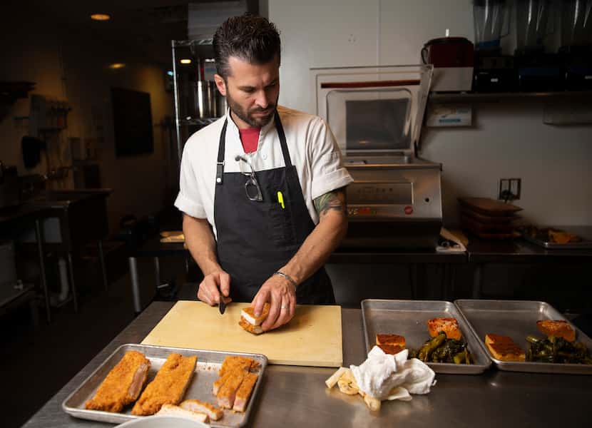Alex Astranti cuts turkey katsu before the Thanksgiving dinner at Uchi in Uptown Dallas. 