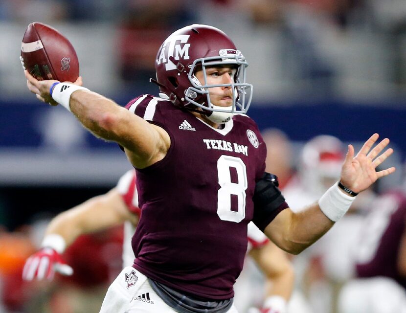 Texas A&M Aggies quarterback Trevor Knight (8) throws a pass in the third quarter against...