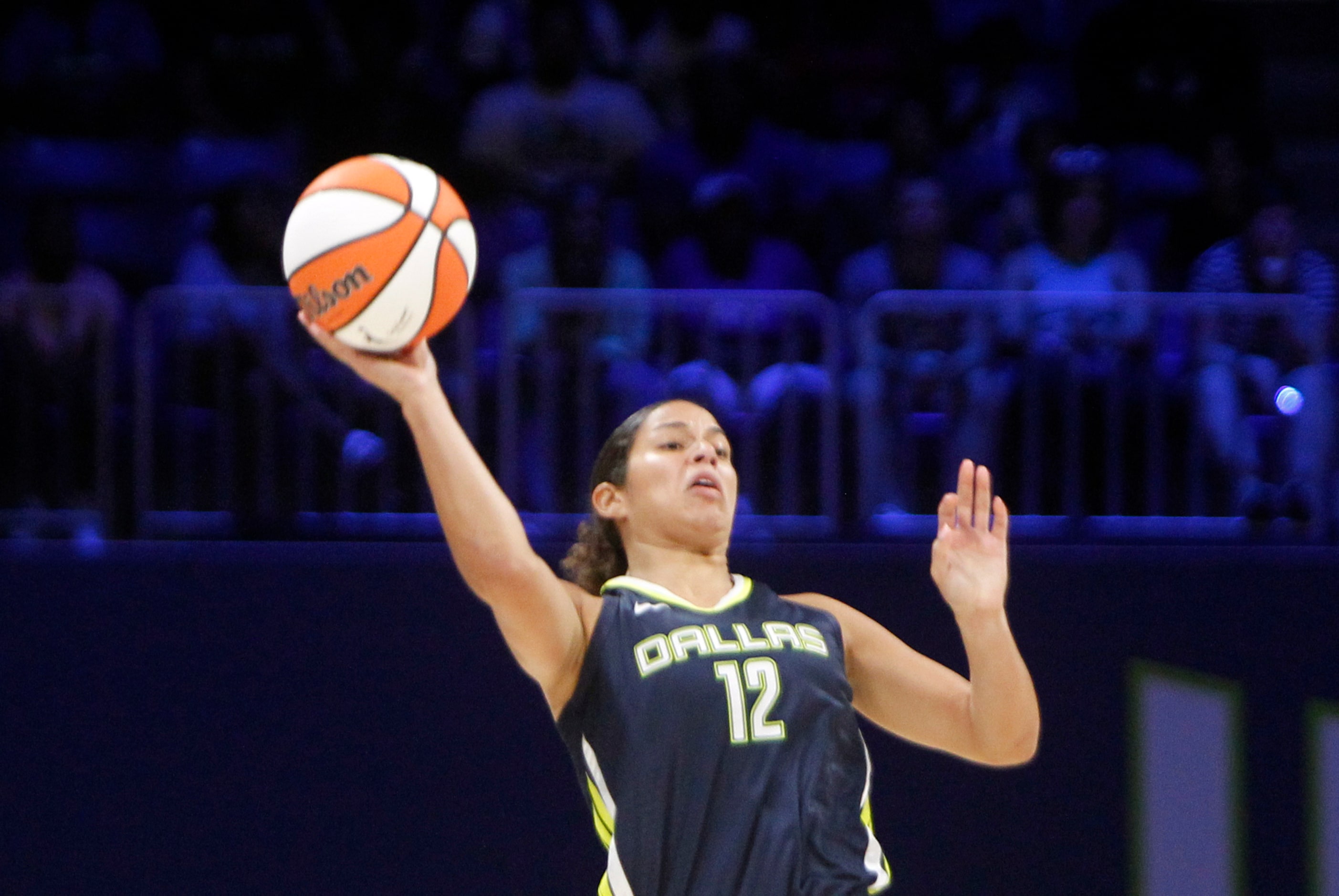 Dallas Wings guard Veronica Burton (12) launches a long last second desperation shot in the...