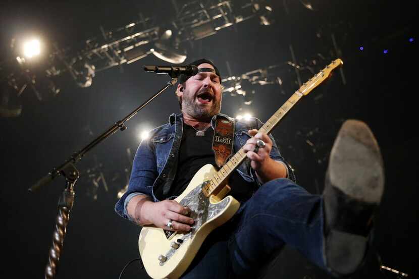 Lee Brice performs before Luke Bryan at the Gexa Energy Pavilion in Dallas Saturday...
