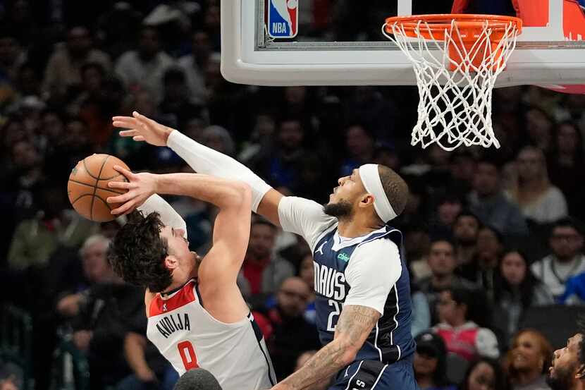Washington Wizards forward Deni Avdija (8) shoots against Dallas Mavericks center Daniel...
