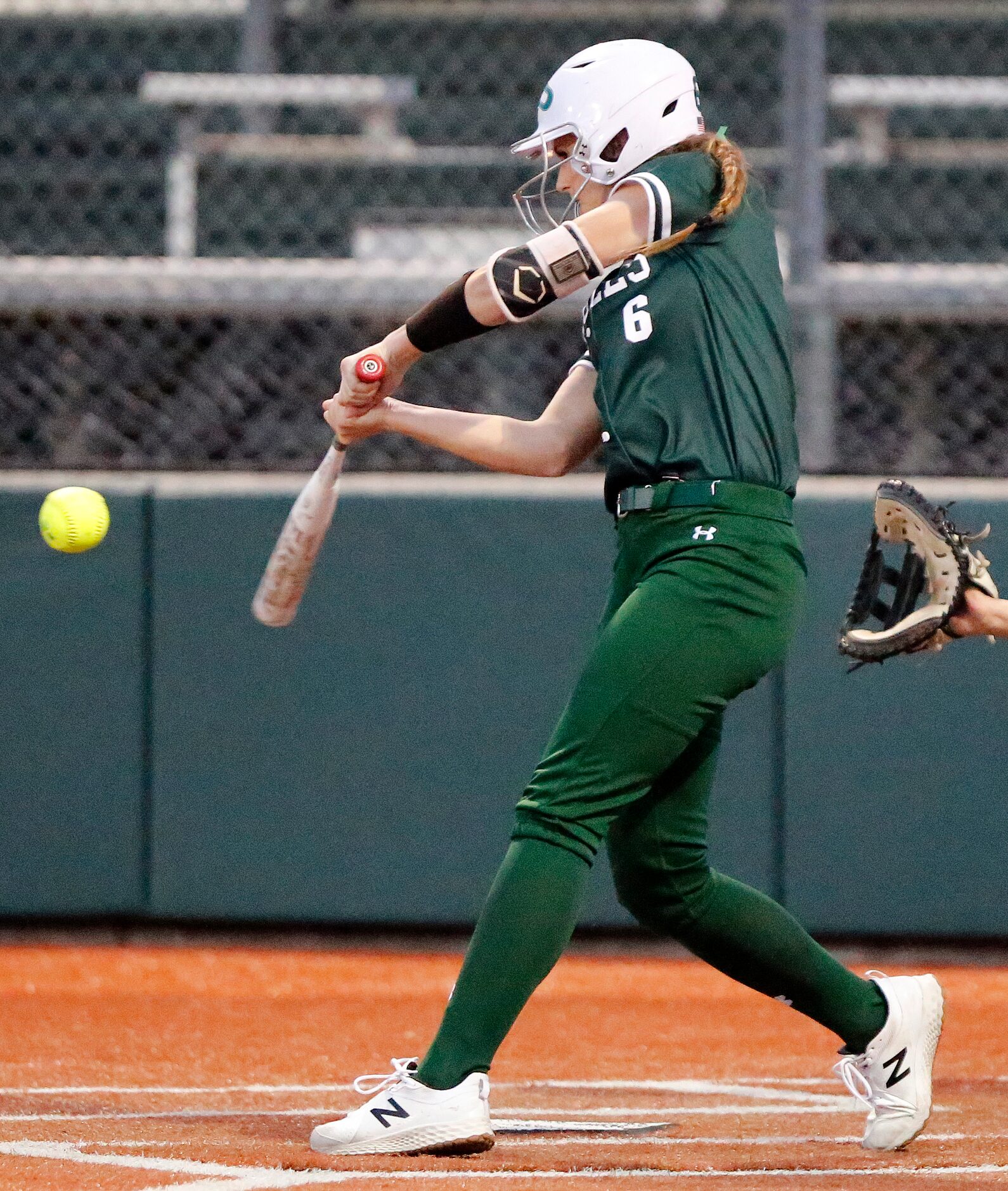 Prosper High School third baseman Elizabeth Moffitt (6) hits a home run in the second inning...