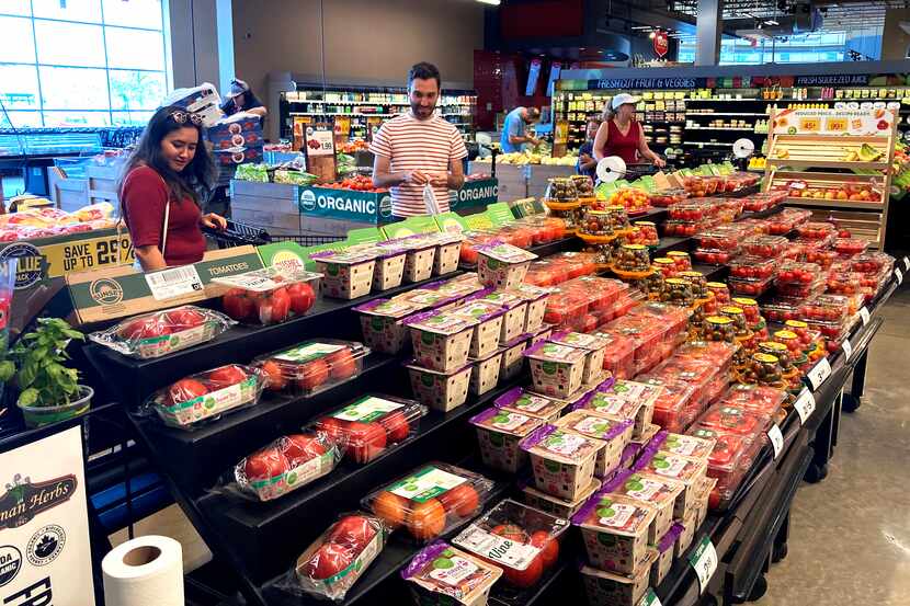 Shoppers browsed a grocery store in Glenview, Ill., on Monday, July 4, 2022.  U.S. demand...