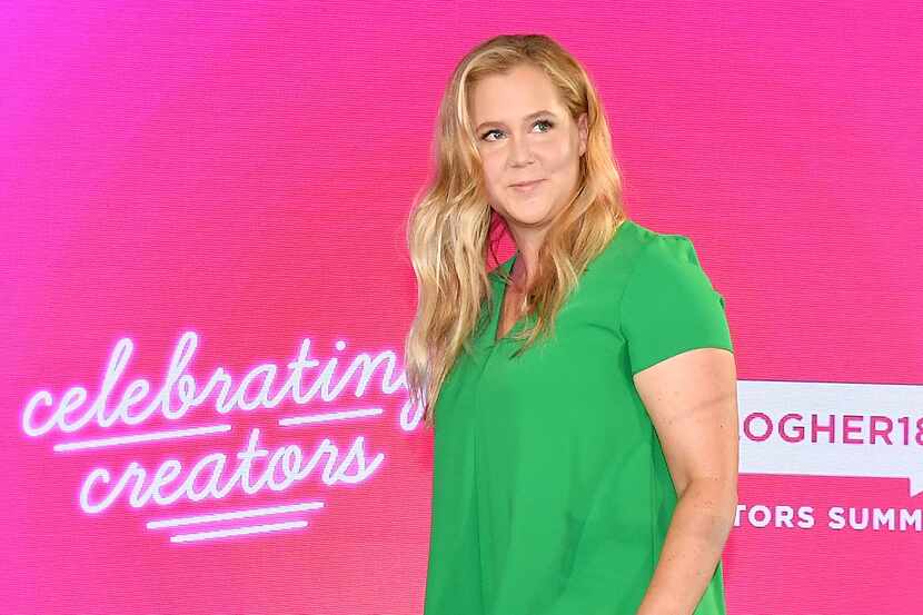 Amy Schumer walks onstage at the #BlogHer18 Creators Summit at Pier 17 on August 8, 2018 in...