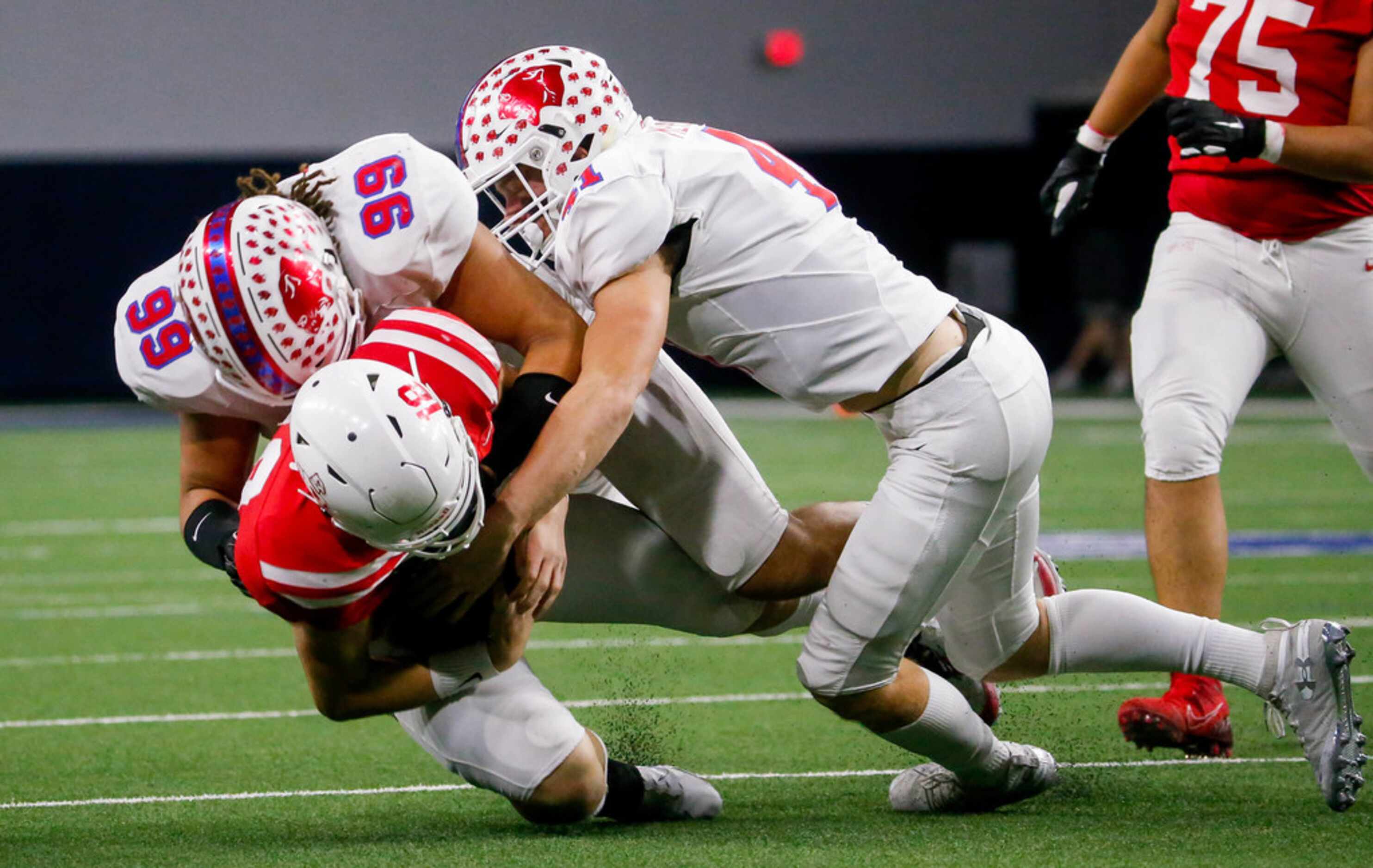 Houston St. ThomasÃ quarterback Maddox Kopp (18) is sacked in the first quarter of a TAPPS...