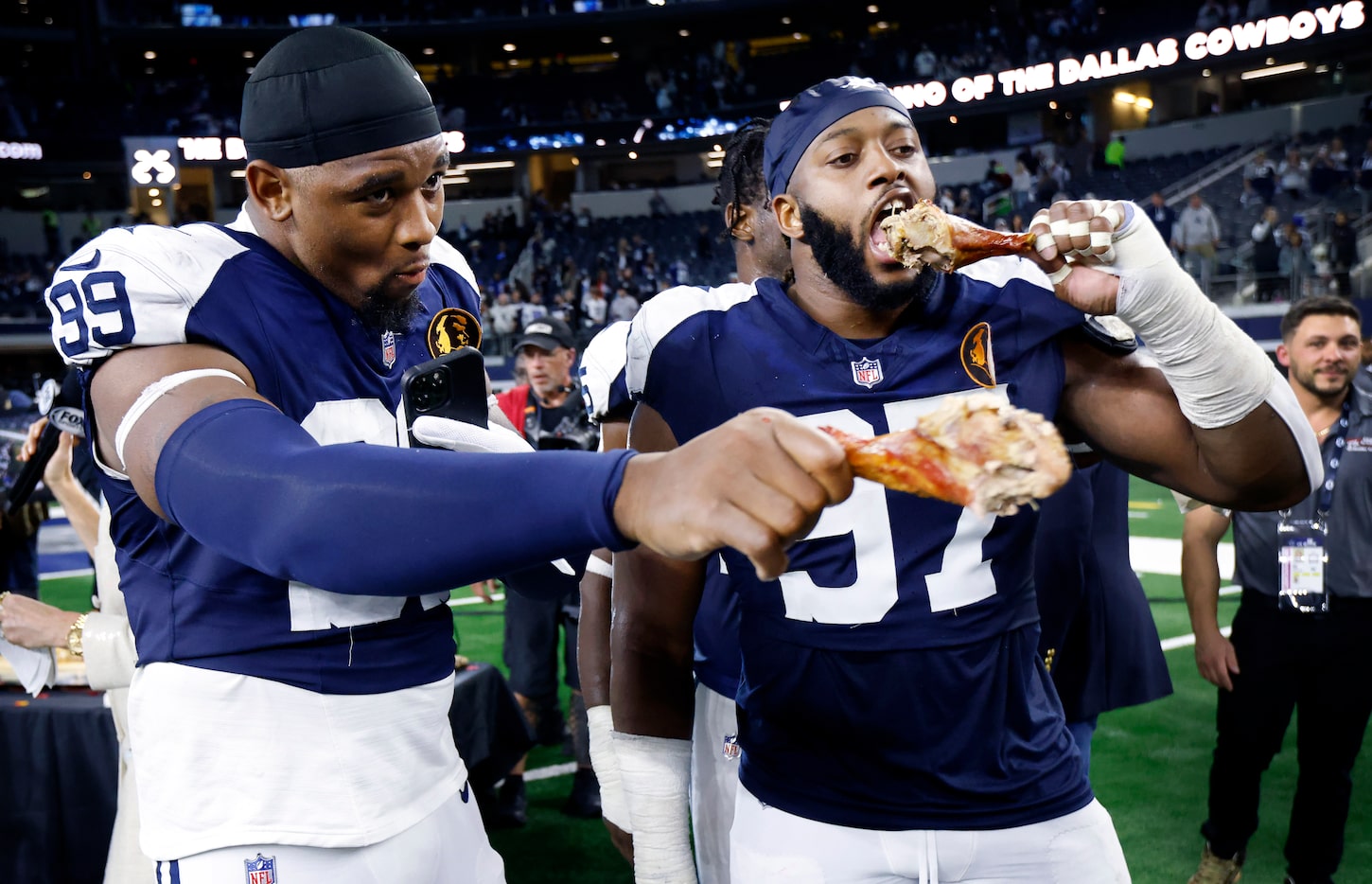 Dallas Cowboys defensive end Chauncey Golston (99) and defensive tackle Osa Odighizuwa (97)...