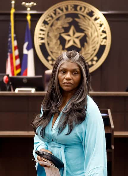 LaTasha Shepard of McKinney appeared in court with her husband to try to settle his...