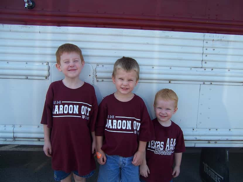 From left, Alex, Ryan and Carson Dyke before a Texas A&M football game. After Carson's...