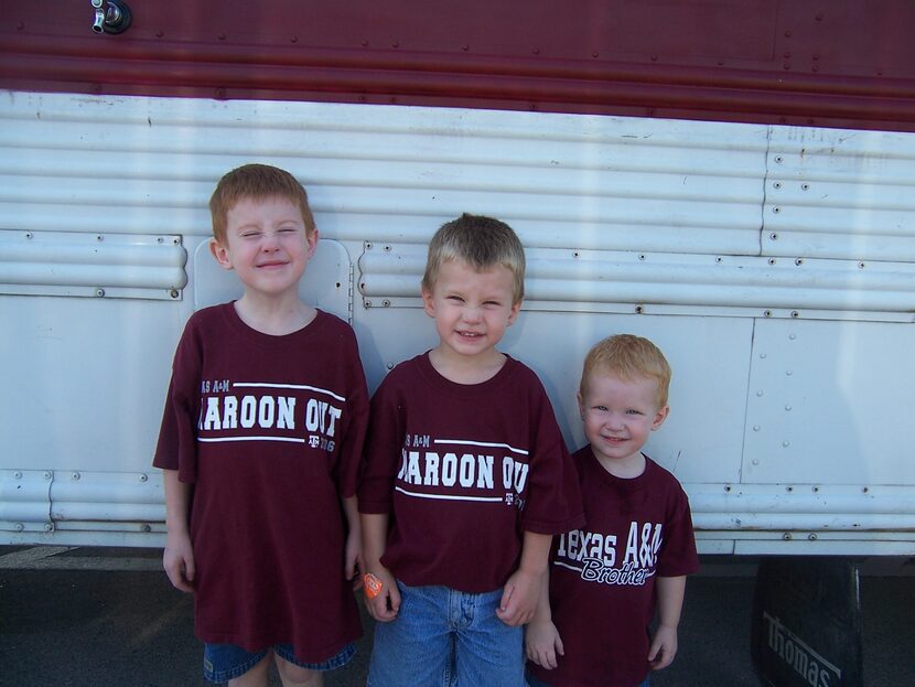 From left, Alex, Ryan and Carson Dyke before a Texas A&M football game. After Carson's...