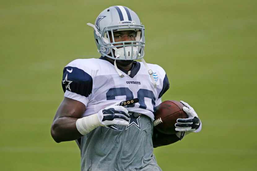 New Dallas running back Christine Michael (30) is pictured during Dallas Cowboys practice at...