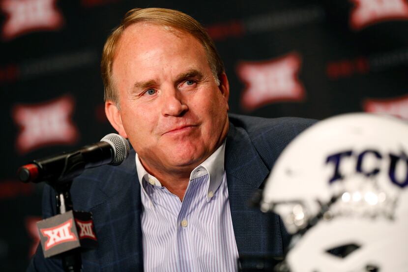 TCU head football coach Gary Patterson listens to a question from  the media assembled for...