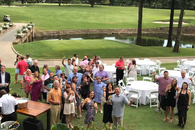 Billingsley Co. workers gathered for a party on a golf course. The family-owned company...