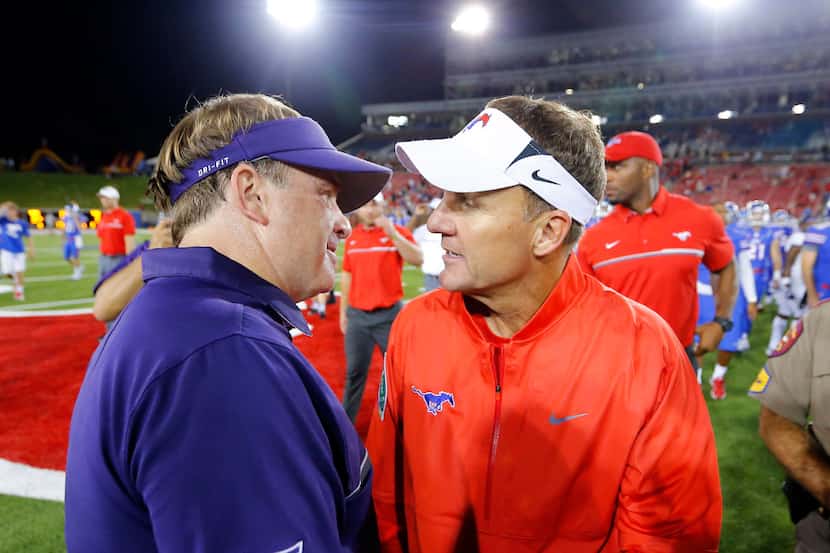 TCU Horned Frogs head coach Gary Patterson (left) and Southern Methodist Mustangs head coach...