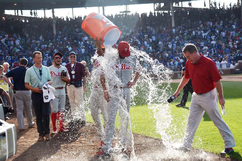 CHICAGO, IL - JULY 25: Cole Hamels #35 of the Philadelphia Phillies gets a ice water bath...