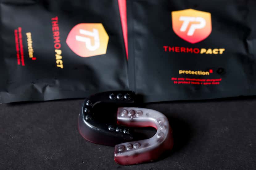 Difference between the color changes of ThermoPact oral mouth guards after it was placed in...