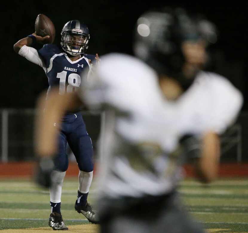 Frisco Lone Star quarterback Jason Shelley (18) throws the ball in the second half during a...